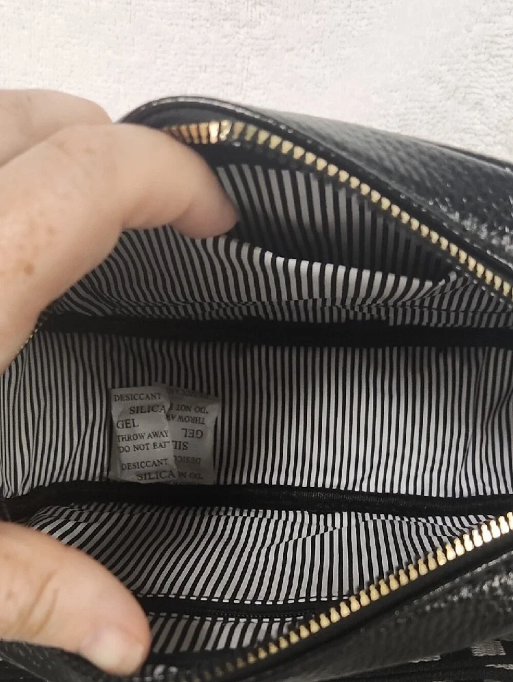 Black Crossbody Bag with Metallic Multi-Color Diagonal Stripes